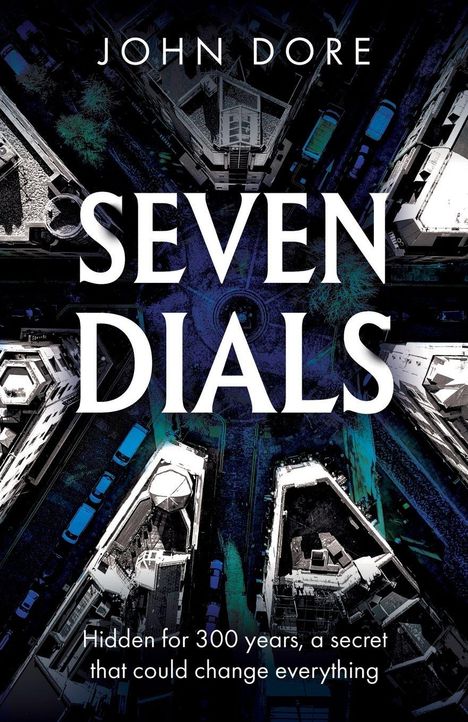 "JOHN DORE SEVEN DIALS. Hidden for 300 years, a secret that could change everything." Vogelperspektive auf Stadt.