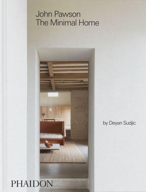 "John Pawson The Minimal Home by Deyan Sudjic. PHAIDON." Blick durch Tür in minimalistisches Wohnzimmer mit Sofa und Decke.