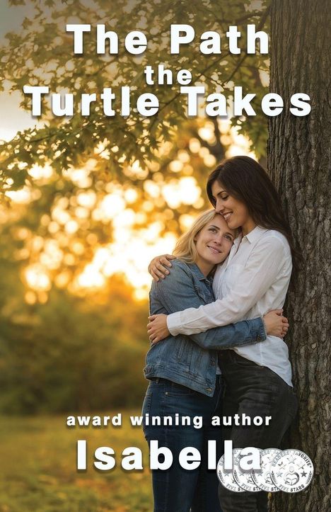 Text: "The Path the Turtle Takes", "award winning author Isabella." Zwei Frauen umarmen sich im Wald bei Sonnenuntergang.
