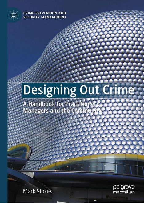 "Designing Out Crime" von Mark Stokes. Moderne Fassade mit silbernen, kreisförmigen Elementen.