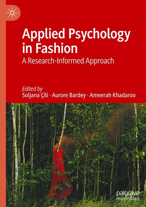 "Applied Psychology in Fashion: A Research-Informed Approach", rote Schrift oben, Waldhintergrund, rote Kleidung in Bäumen.