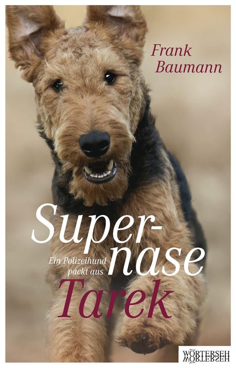 Der Titel "Supernase Tarek: Ein Polizeihund packt aus" von Frank Baumann mit einem fröhlichen Hund im Vordergrund.