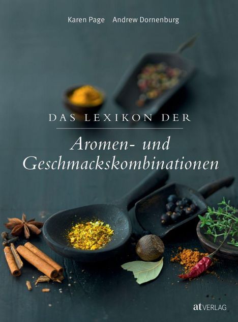 "Das Lexikon der Aromen- und Geschmackskombinationen". Zwei Löffel mit Gewürzen auf dunklem Hintergrund.