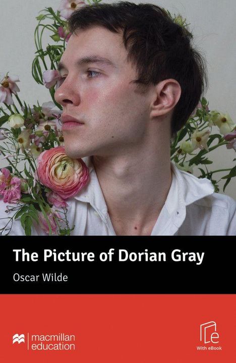 „The Picture of Dorian Gray“ und „Oscar Wilde“. Ein Mann mit Blumen umgeben, trägt ein weißes Hemd.