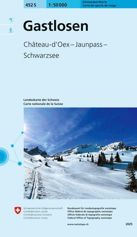 „Gastlosen“, „Château-d’Oex – Jaunpass – Schwarzsee“. Schneelandschaft mit Bergen und Skispuren, klarer blauer Himmel.