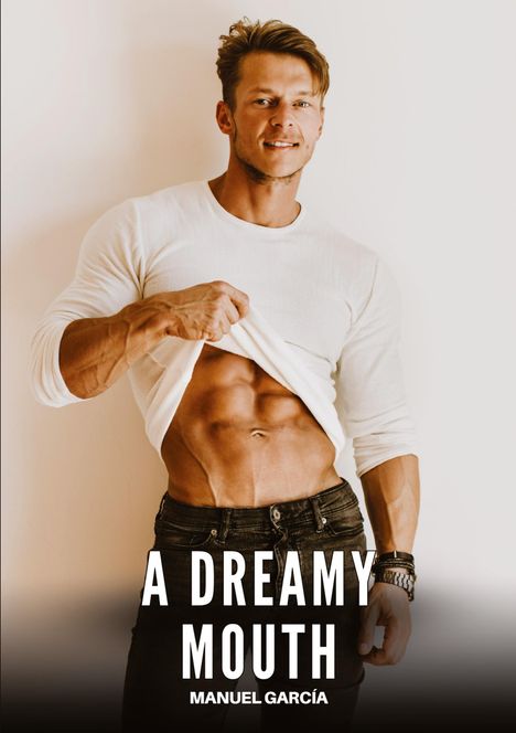 "A DREAMY MOUTH - MANUEL GARCÍA" steht unten. Ein Mann in weißem Shirt zeigt definierte Bauchmuskeln, lächelt leicht.