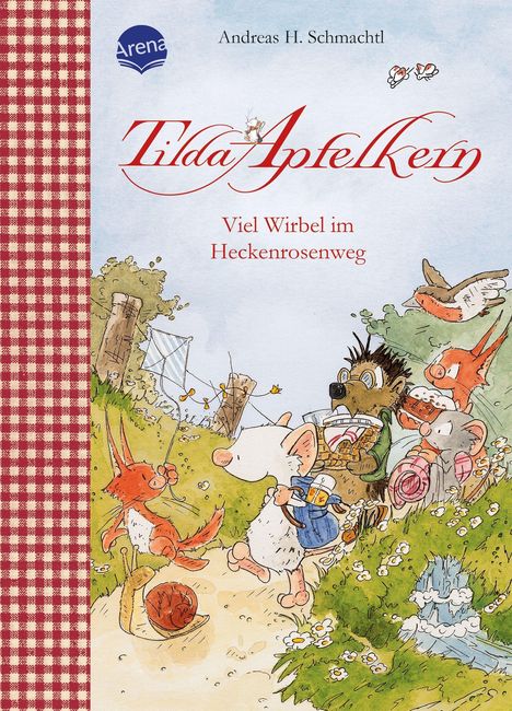 Ein Buchcover zeigt "Tilda Apfelkern - Viel Wirbel im Heckenrosenweg" von Andreas H. Schmachtl. Tiere wandern fröhlich.