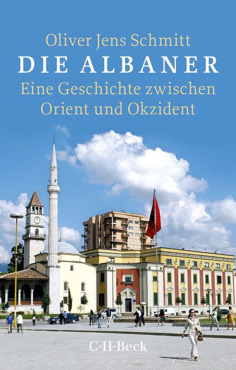 Text: "Oliver Jens Schmitt, DIE ALBANER, Eine Geschichte zwischen Orient und Okzident." Gebäude mit Minarett und Flagge.