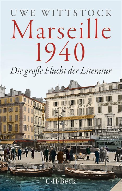 "Uwe Wittstock: Marseille 1940. Die große Flucht der Literatur." zeigt eine Straßenszene mit alten Gebäuden und Menschen.