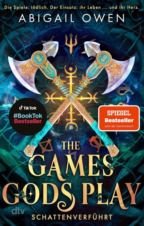 Oben: "Die Spiele: tödlich. Der Einsatz: ihr Leben ... und ihr Herz." Titel: "The Games Gods Play". Unten: "Schattenverführt". 

Große Äxte kreuzen sich vor einem mystischen Hintergrund. Links: "#BookTok Bestseller". Rechts: "SPIEGEL Bestseller".