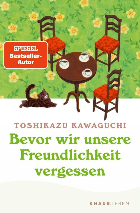 SPIEGEL Bestseller-Autor. Toshikazu Kawaguchi, "Bevor wir unsere Freundlichkeit vergessen". Katze, Tisch, 3 Stühle.