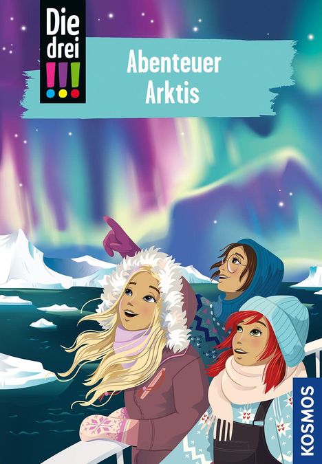 Text: "Die drei !!! Abenteuer Arktis." Illustration von drei jungen Mädchen in warmer Kleidung unter Nordlichtern.