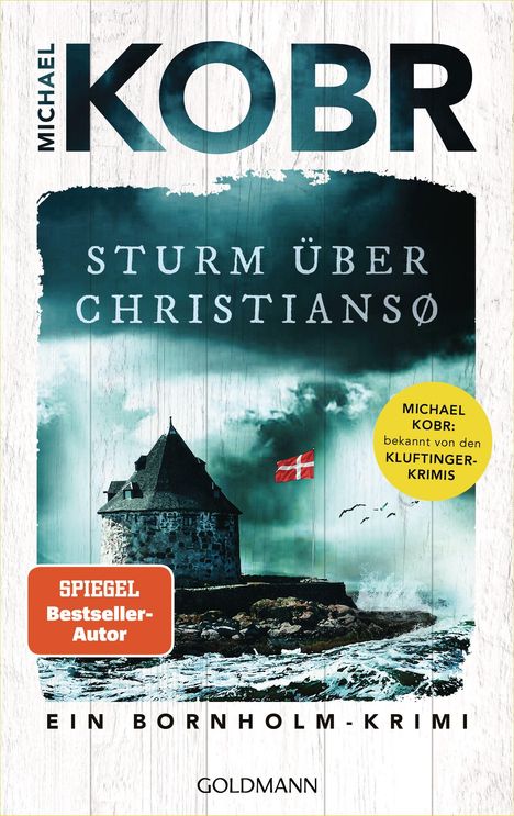 "Michael Kobr, Sturm über Christiansø, Ein Bornholm-Krimi; dunkel, stürmisches Meer, Burg mit Flagge, Vögel fliegen."