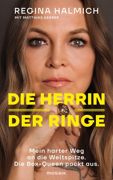 "REGINA HALMICH MIT MATTHIAS KERBER. DIE HERRIN DER RINGE. Mein harter Weg an die Weltspitze. Die Box-Queen packt aus." Gesicht einer Frau.