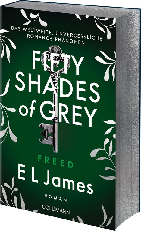 Text: "Das weltweite, unvergessliche Romance-Phänomen. FIFTY SHADES OF GREY. FREED. E L James. Roman. Goldmann."  
Ein grünes Buchcover mit einem antiken Schlüssel und weißen Ranken.
