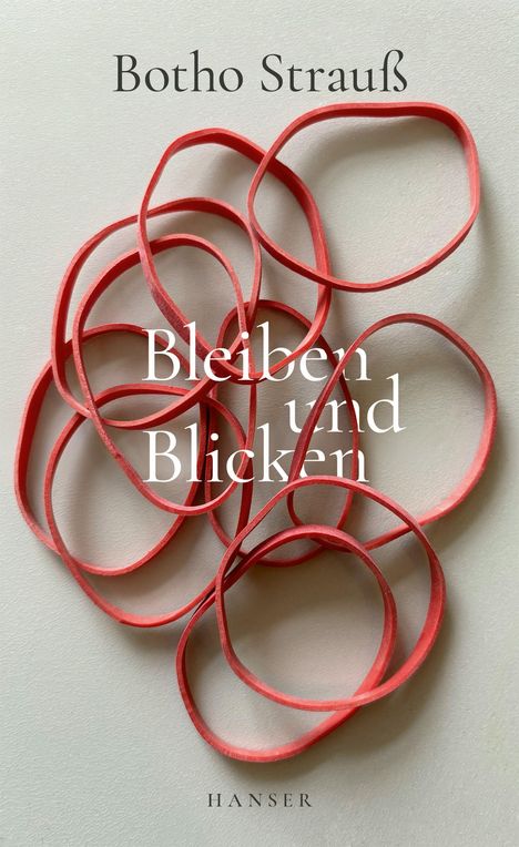 Text: "Botho Strauß", "Bleiben und Blicken", "HANSER". Mehrere rote Gummibänder auf hellgrauem Hintergrund.