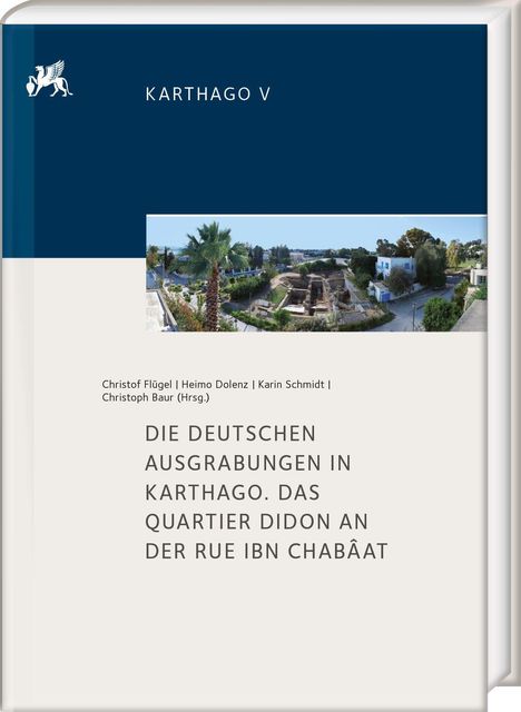 Text: "KARTHAGO V", "DIE DEUTSCHEN AUSGRABUNGEN IN KARTHAGO. DAS QUARTIER DIDON AN DER RUE IBN CHABÂAT". Panorama von Ruinen und Bäumen.