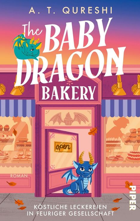 Titel: "The Baby Dragon Bakery", A. T. Qureshi. Ein kleiner, blauer Drache sitzt vor einer rosa Bäckerei.