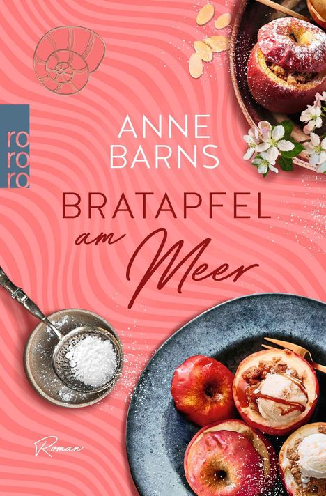 "Anne Barns, Bratapfel am Meer, Roman." Rote Äpfel mit Füllung, Puderzucker und Blumen auf rotem Hintergrund mit Spiralmuster.