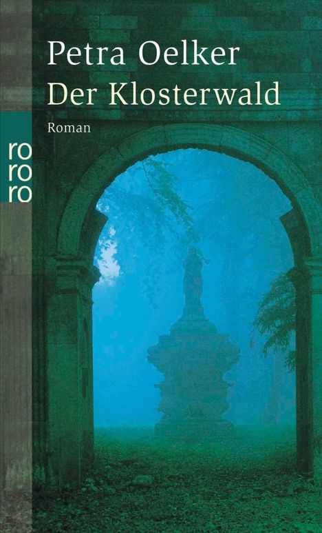 Petra Oelker, Der Klosterwald, Roman. Ein steinerner Torbogen mit einem nebligen Wald im Hintergrund.