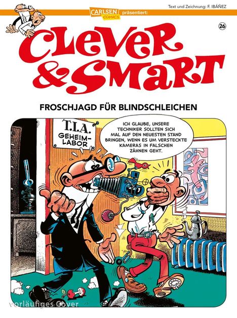 Text: "Froschjagd für Blindschleichen", "T.I.A. Geheimlabor". Zwei Figuren, eine mit Kamera im Mund, stehen im Labor.