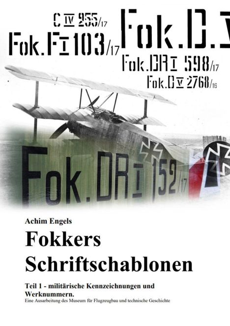 Achim Engels: Fokkers Schriftschablonen. Historisches Flugzeug mit Militärkennzeichnung im Hintergrund.