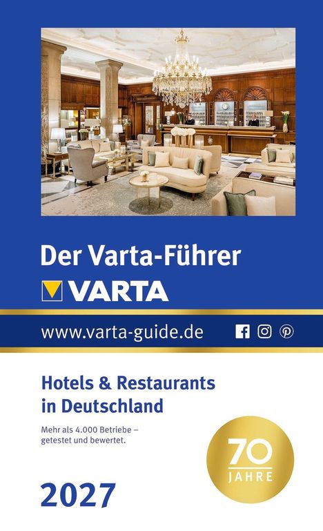 "Der Varta-Führer" und "Hotels & Restaurants in Deutschland". Ein eleganter Hotel-Lobby-Bereich mit Kronleuchter.