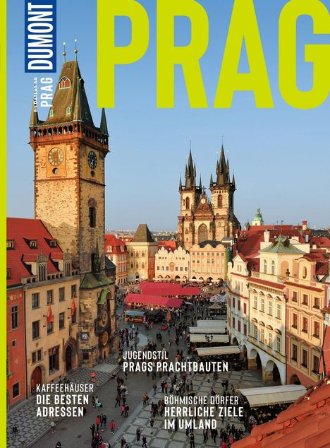 „PRAG, DUMONT, BILDTAT5 44, KAFFEEHÄUSER DIE BESTEN ADRESSEN, JUGENDSTIL PRAGS PRACHTBAUTEN, BÖHMISCHE DÖRFER HERRLICHE ZIELE IM UMLAND“. Eine historische Uhr und gotische Architektur im Vordergrund.