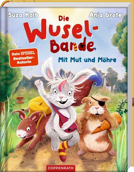 „Die Wuselbande: Mit Mut und Möhre“ von Suza Kolb und Anja Grote. Drei fröhliche Tiere auf einem Waldweg.