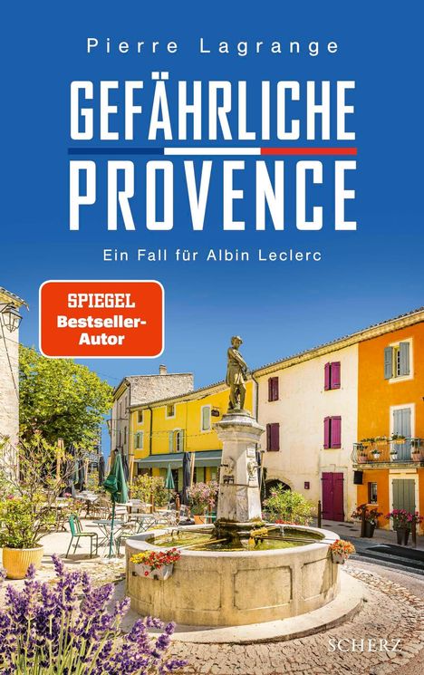 „Pierre Lagrange: Gefährliche Provence. Ein Fall für Albin Leclerc. SPIEGEL Bestseller-Autor.“ Ein sonniger Platz mit Brunnen.