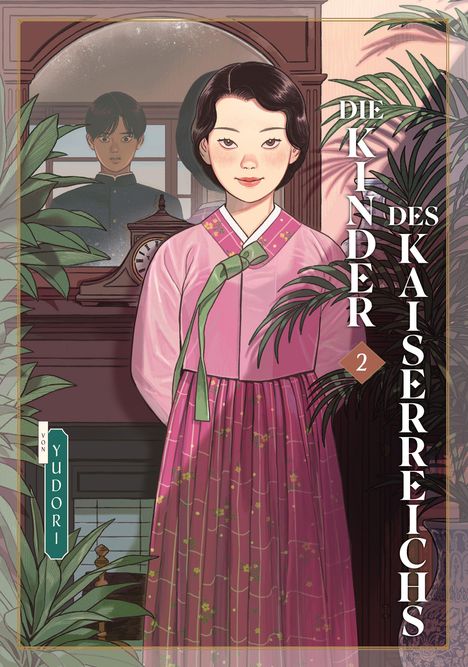 "Die Kinder des Kaiserreichs" steht vertikal. Eine Frau in traditionellem rosa Gewand lächelt. Ein Mann im Hintergrund.