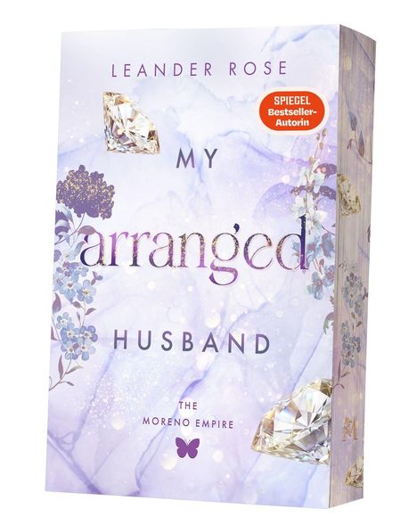 "LEANDER ROSE MY arranged HUSBAND THE MORENO EMPIRE". Lila Cover mit Blumen, Schmetterling und Diamanten.