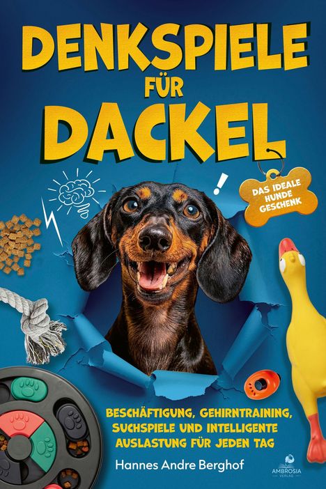 "DENKSPIELE FÜR DACKEL" oben, "DAS IDEALE HUNDEGESCHENK" daneben. Ein fröhlicher Dackel lächelt, umgeben von Spielzeug.