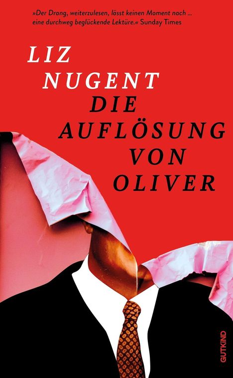 „Liz Nugent, Die Auflösung von Oliver“. Zerrissenes Papier enthüllt einen Anzug und eine Krawatte.