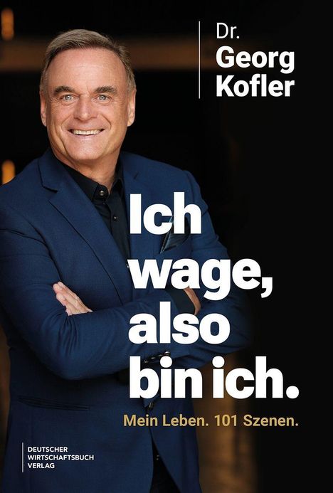 „Dr. Georg Kofler. Ich wage, also bin ich. Mein Leben. 101 Szenen.“ Ein Mann in einem blauen Anzug lächelt.