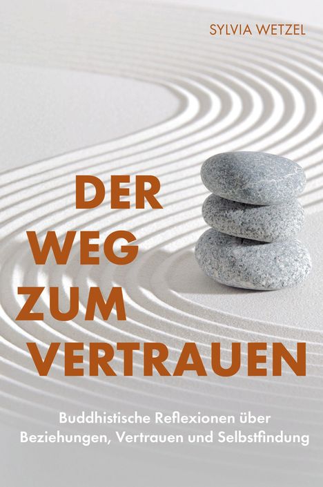 Oben "SYLVIA WETZEL". Text: "DER WEG ZUM VERTRAUEN". Drei Steine auf Sand mit Wellenmustern darunter.
