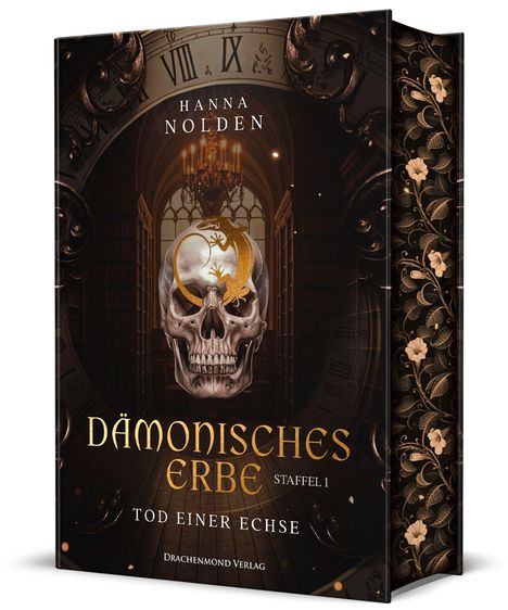Buchcover: "Dämonisches Erbe - Staffel 1: Tod einer Echse" von Hanna Nolden. Ein Schädel mit goldener Eidechse.