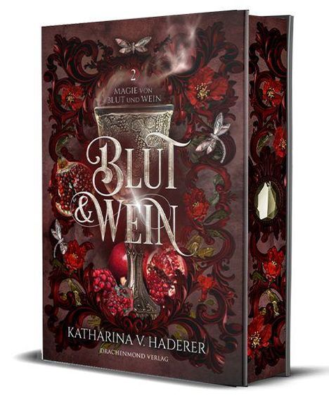 Text: "Blut & Wein", "2 Magie von Blut und Wein", "Katharina V. Haderer", "Drachenmond Verlag". Weinbecher und Granatapfel-Ornamente.