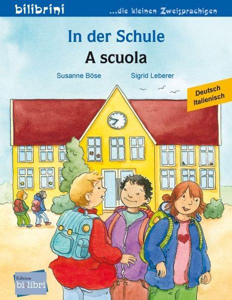 Text: "In der Schule, A scuola, Susanne Böse, Sigrid Leberer, Deutsch Italienisch." Illustration: Kinder vor einer Schule.