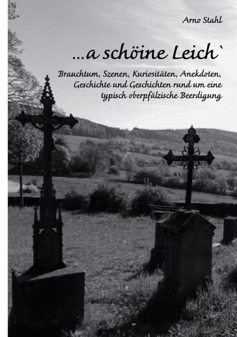 Text: „...a schöine Leich`“ von Arno Stahl. Dazu Grabkreuze auf einer Wiese, im Hintergrund eine Hügellandschaft.