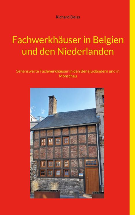 „Fachwerkhäuser in Belgien und den Niederlanden“, Foto eines traditionellen Fachwerkhauses vor blauem Himmel.