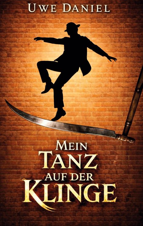 "Uwe Daniel", "Mein Tanz auf der Klinge"; Silhouette eines tanzenden Mannes auf einer großen Klinge vor Ziegelwand.