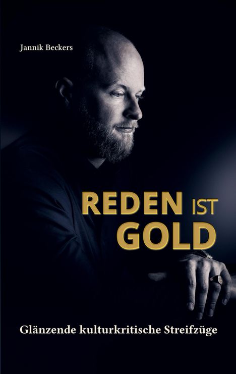 „REDEN IST GOLD – Glänzende kulturkritische Streifzüge“. Seitlich ein bärtiger Mann in nachdenklicher Pose.