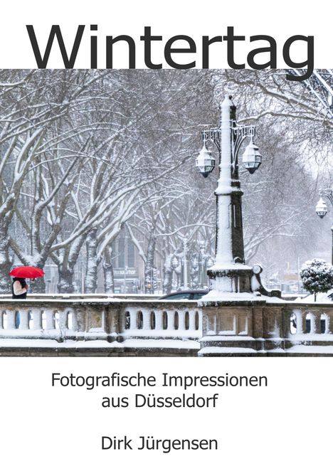 "Wintertag" steht oben, darunter "Fotografische Impressionen aus Düsseldorf" und "Dirk Jürgensen". Verschneite Allee, roter Regenschirm.