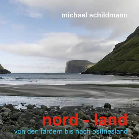 Text: "michael schildmann", "nord - land", "von den färöern bis nach ostfriesland". Küstenlandschaft mit Bergen, Meer und Wolken.