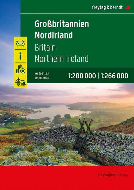 Großbritannien Nordirland Autoatlas. Landschaft mit See, grüne Hügel, Steinmauer, Holzleiter.