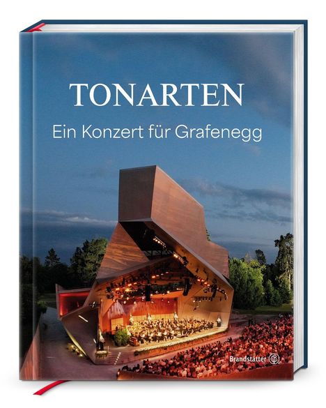 Text: "TONARTEN Ein Konzert für Grafenegg." Modernes Open-Air-Konzert vor Naturkulisse, mit beleuchtetem Bühnengebäude.