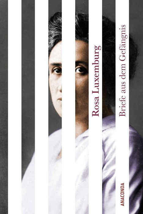 "Rosa Luxemburg, Briefe aus dem Gefängnis, ANACONDA." Ein Porträt von Rosa Luxemburg hinter weißen Balken.