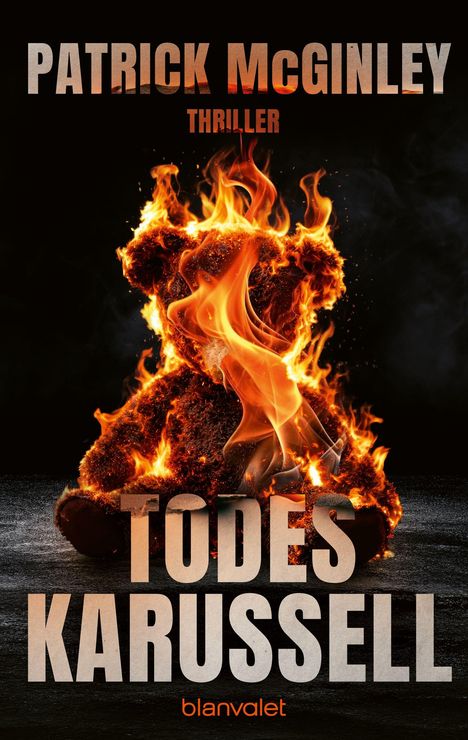 Text: "PATRICK McGINLEY", "THRILLER", "TODESKARUSSELL", "blanvalet". Ein brennender Teddybär vor schwarzem Hintergrund.