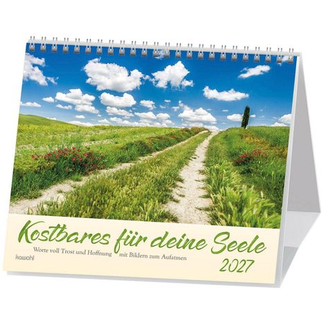 "Kostbares für deine Seele 2027" steht auf einem Kalender. Eine ländliche Landschaft mit Weg und blühenden Wiesen.